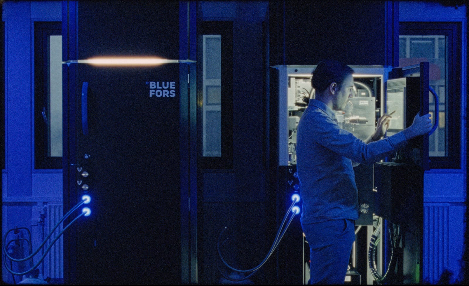 Researcher working with quantum hardware in the laboratory